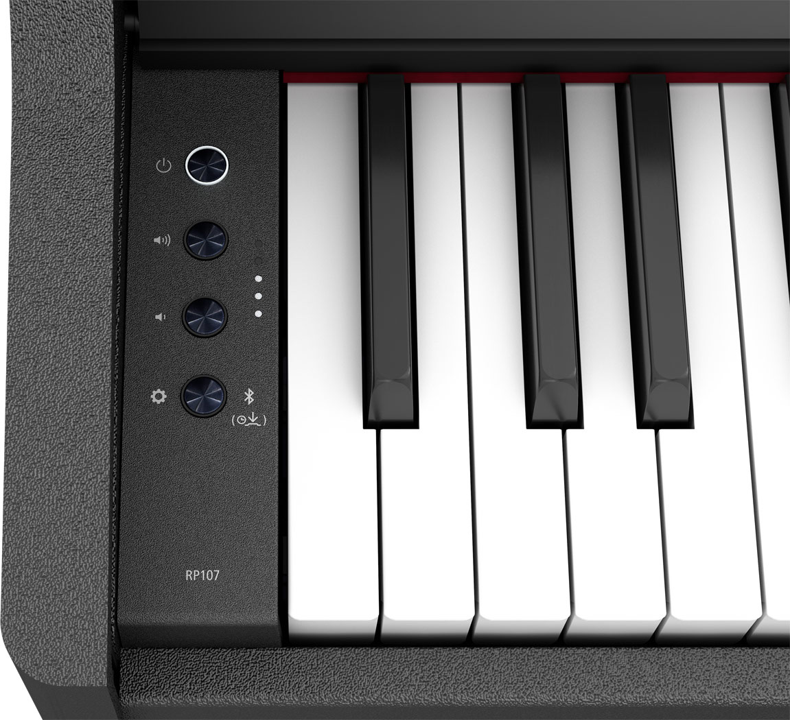 Панель управления Roland RP-107 слева от клавиатуры: четыре кнопки, три светодиода и маркировка RP107